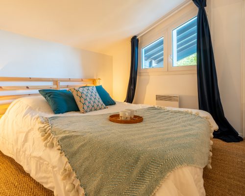 Breakfast on a red bed, wake up healthy with a tray with cups of coffee